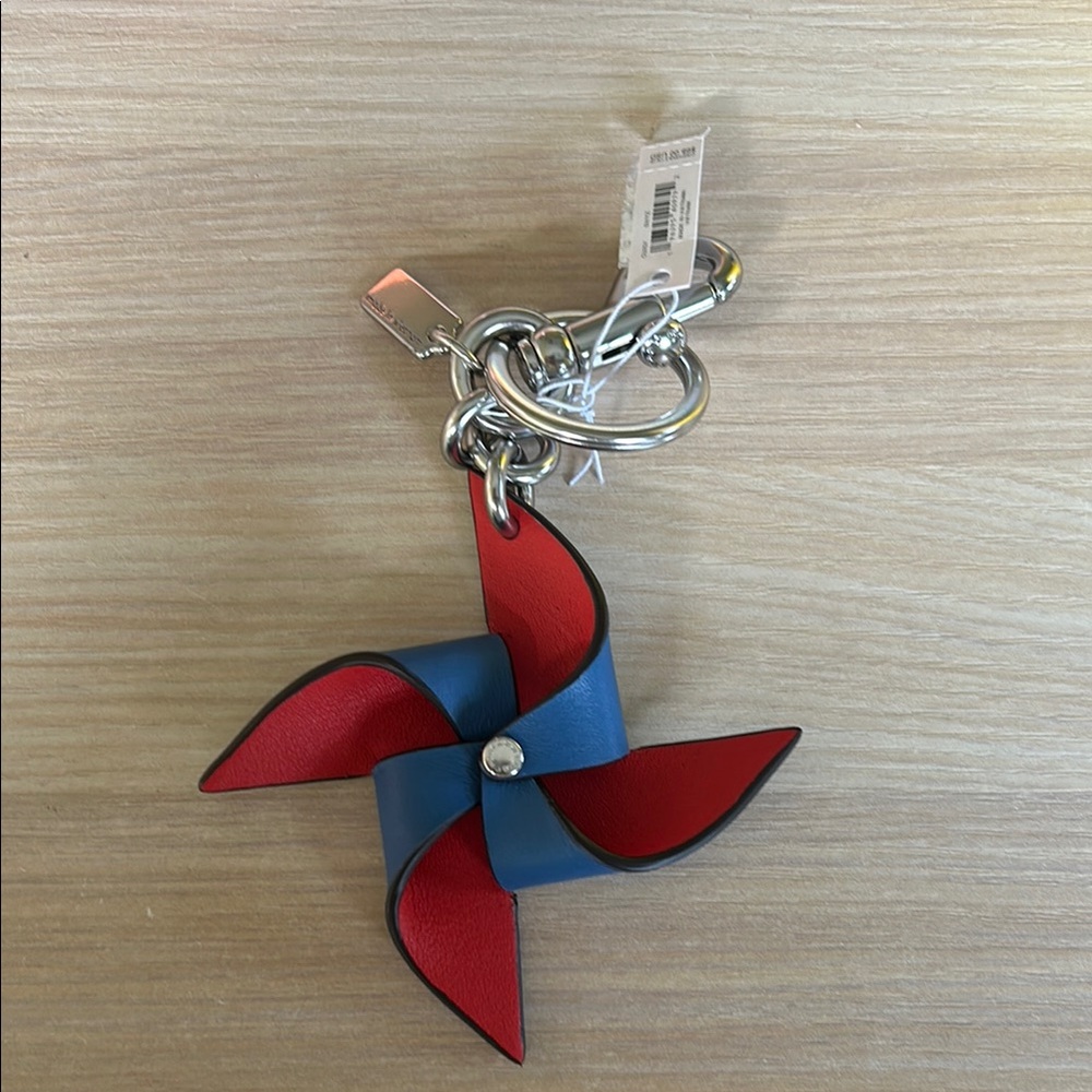 Coach Blue Leather Pinwheel Keychain